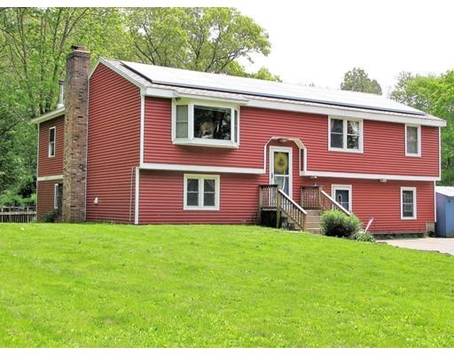 48 St George Road Brimfield, MA 01010 - Photo 1 of 29 a front view of a house with a yard