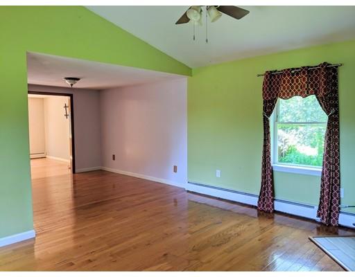 48 St George Road Brimfield, MA 01010 - Photo 13 of 29 an empty room with wooden floor and windows