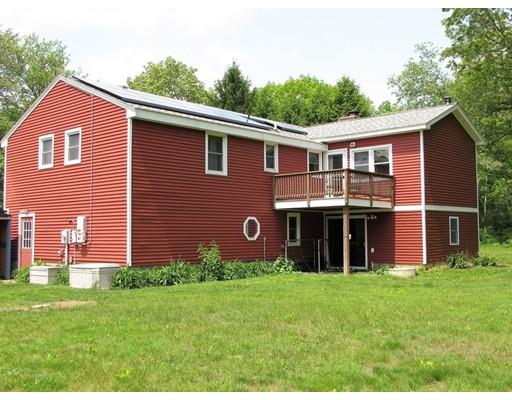 48 St George Road Brimfield, MA 01010 - Photo 8 of 29 a front view of a house with a garden