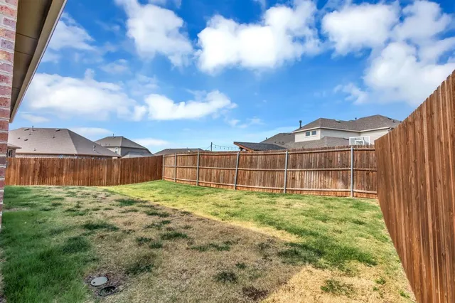 a view of an outdoor space with a house