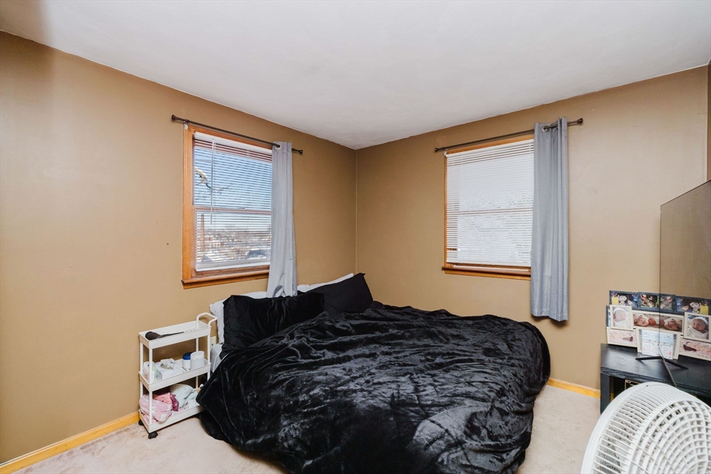 195 Crescent Street, Unit 3 Fall River, MA 02720 - Photo 25 of 34 a bedroom with bed and window