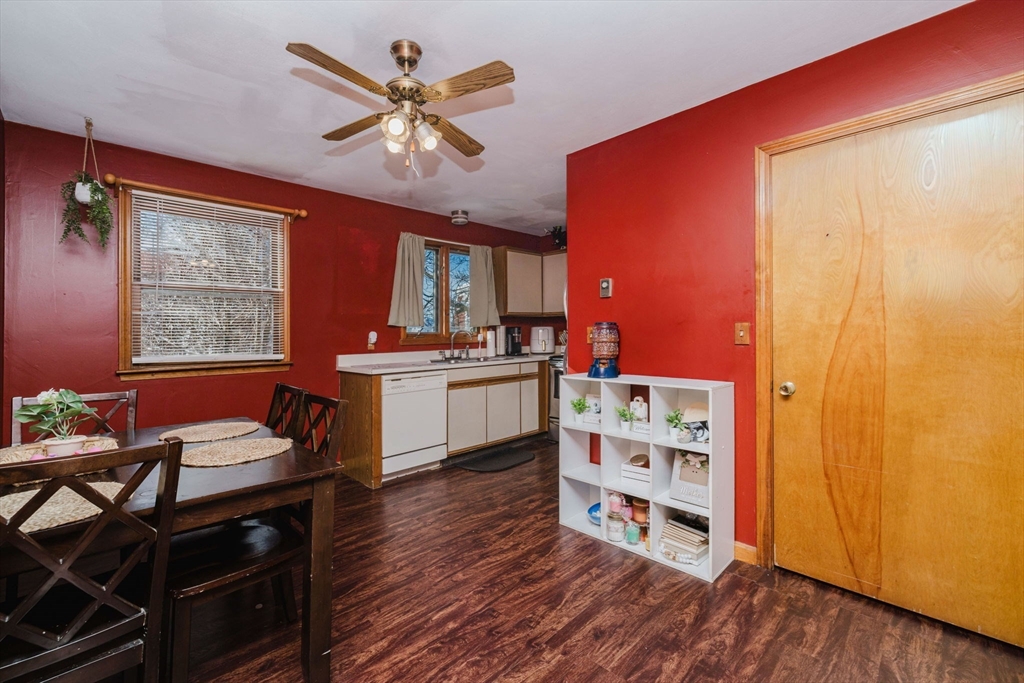 195 Crescent Street, Unit 3 Fall River, MA 02720 - Photo 8 of 34 a living room with stainless steel appliances kitchen island granite countertop wooden cabinets and a stove top oven