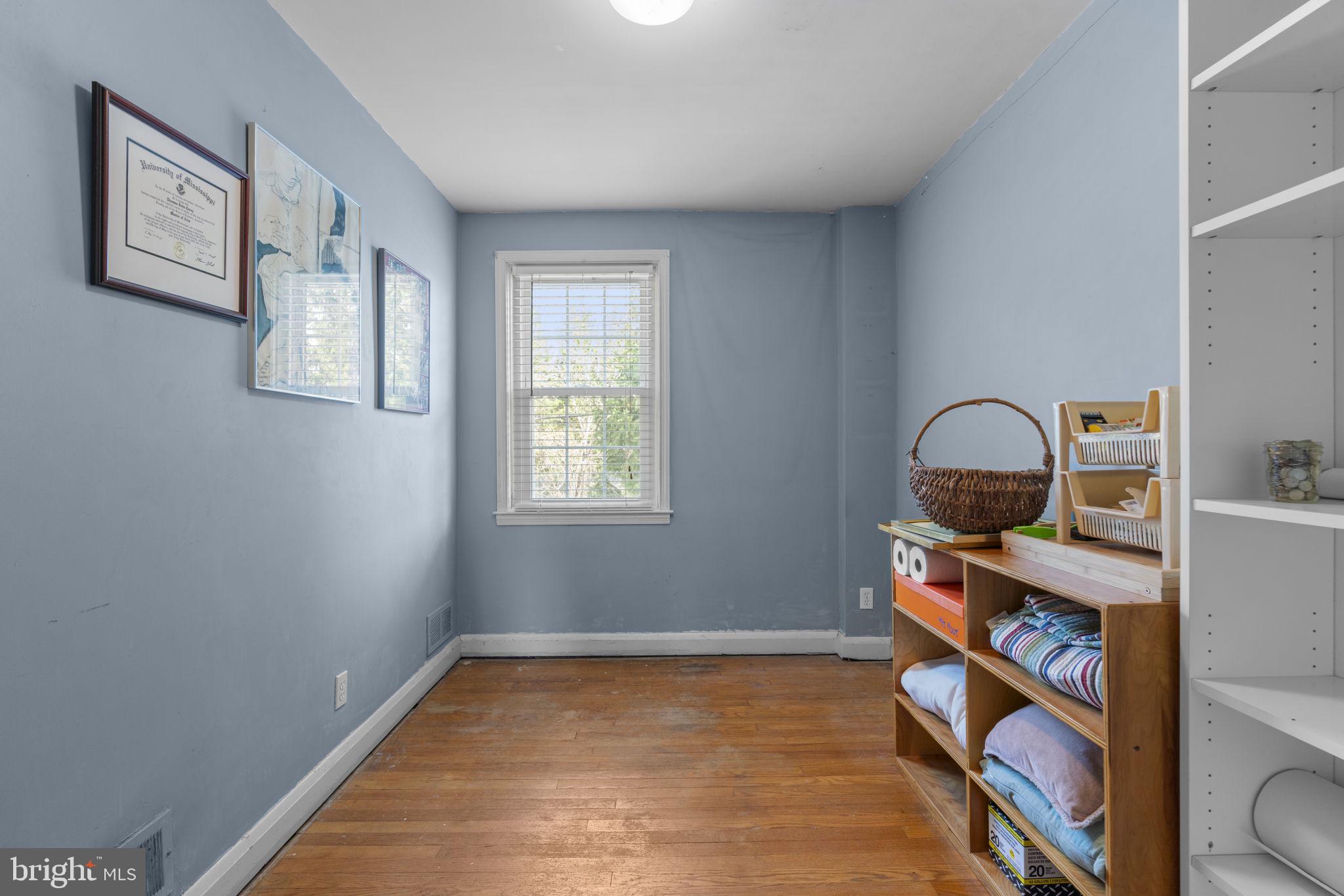 7413 Stanmore Court Baltimore, MD 21212 - Photo 22 of 38 a view of a room that has a bench in it