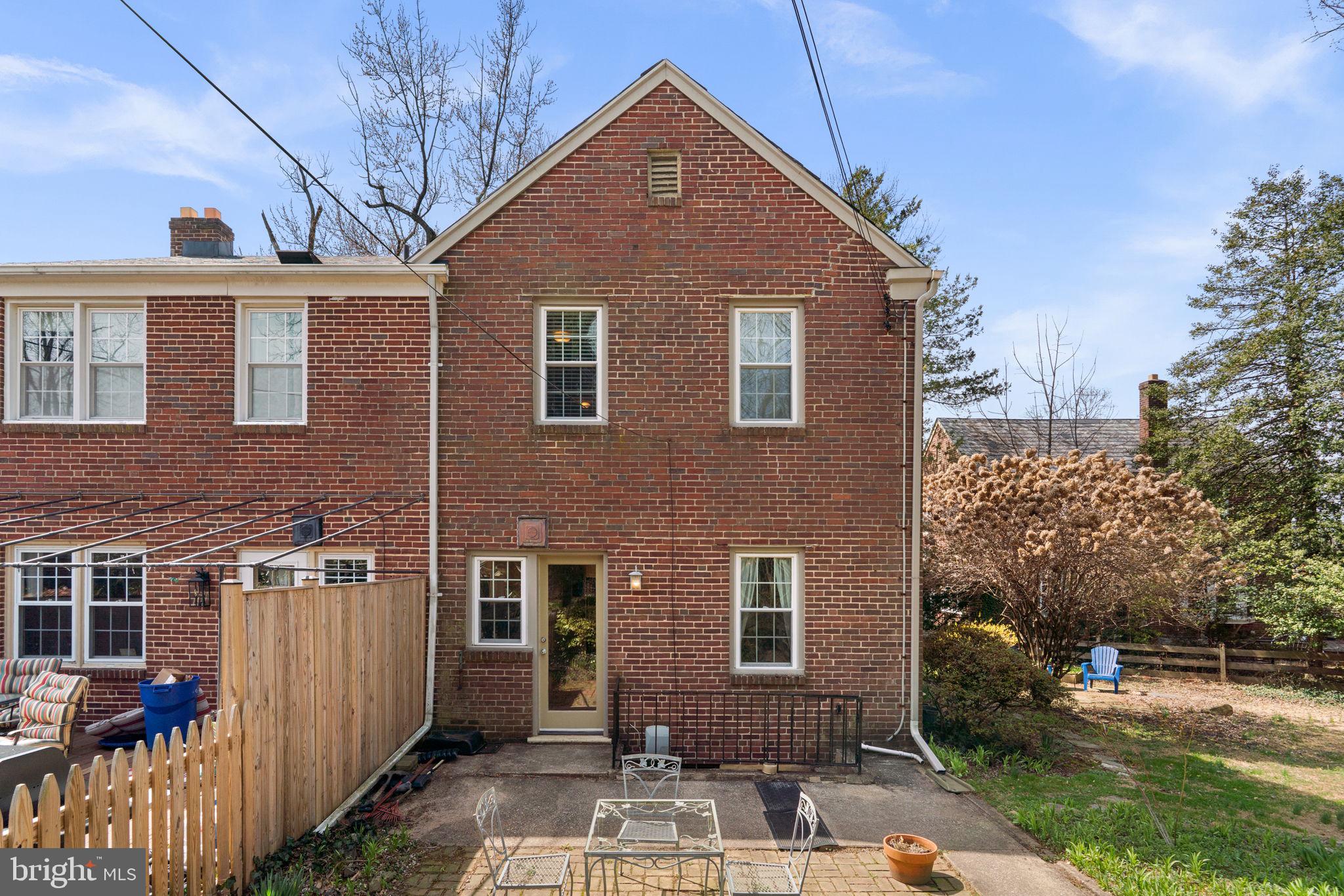 7413 Stanmore Court Baltimore, MD 21212 - Photo 24 of 38 a front view of a house with a yard