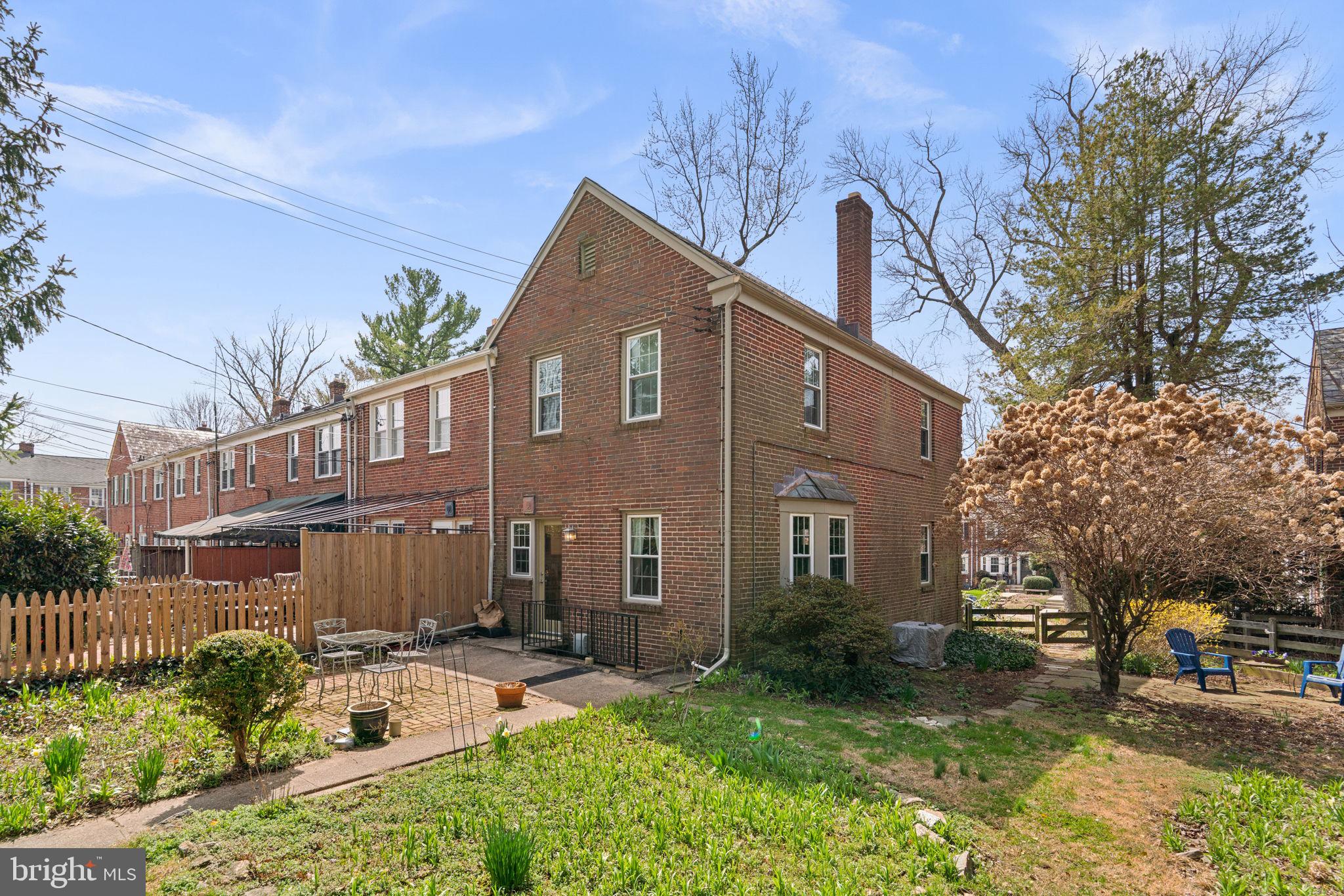 7413 Stanmore Court Baltimore, MD 21212 - Photo 25 of 38 a front view of a house with garden