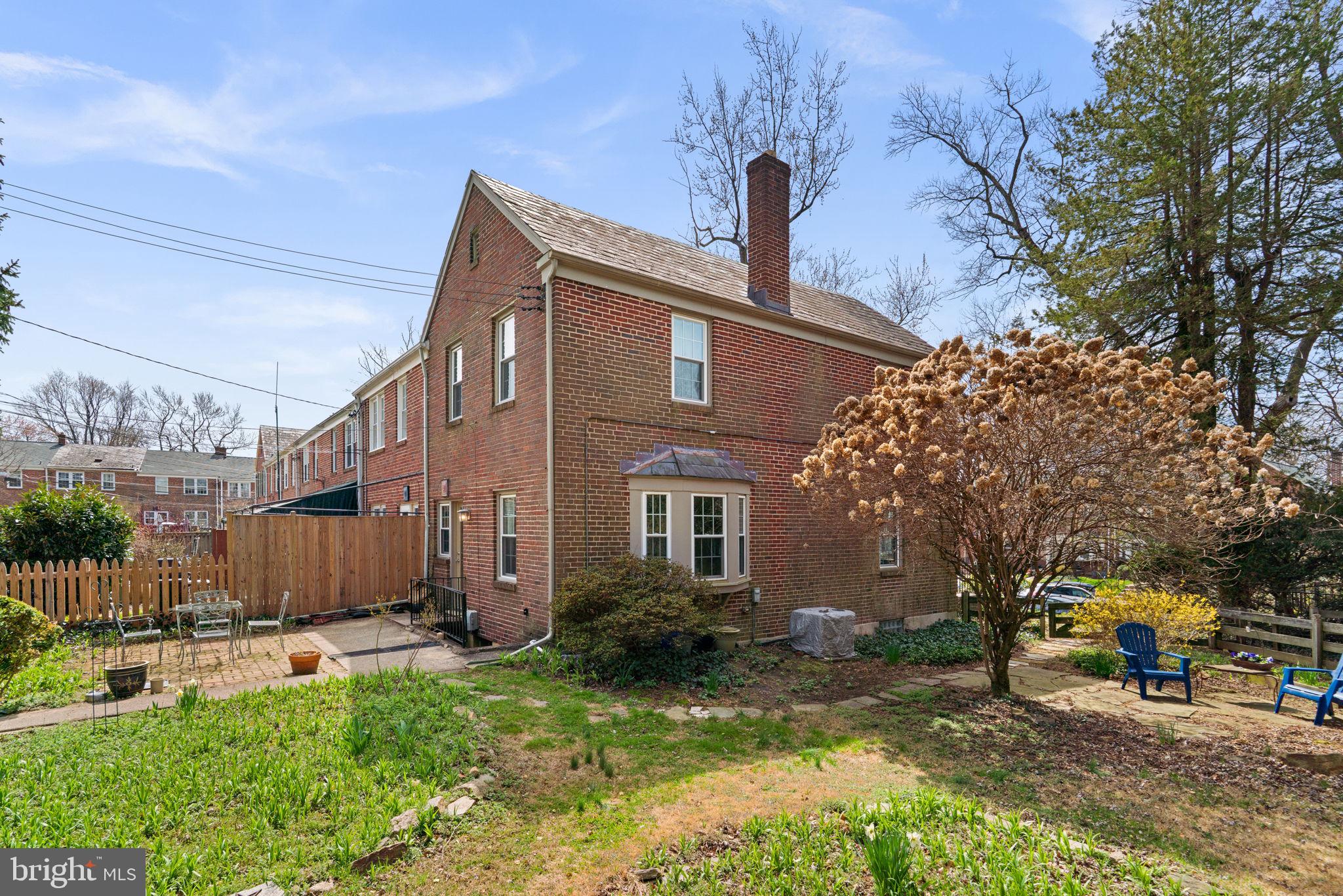 7413 Stanmore Court Baltimore, MD 21212 - Photo 26 of 38 a front view of a house with garden
