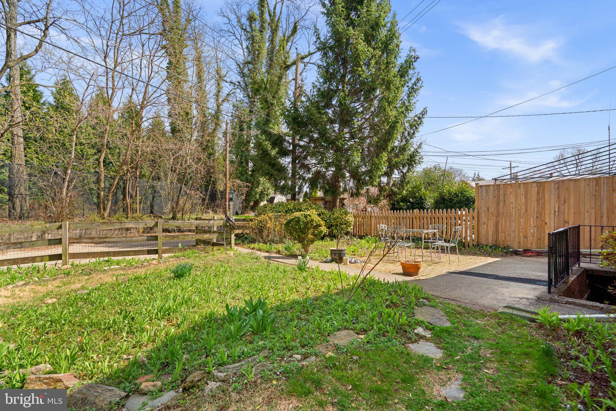 7413 Stanmore Court Baltimore, MD 21212 - Photo 28 of 38 a view of swimming pool with lawn chairs and plants