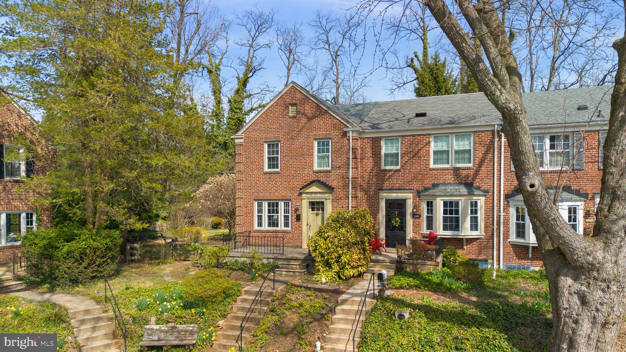 7413 Stanmore Court Baltimore, MD 21212 - Photo 3 of 38 a front view of a house with a garden
