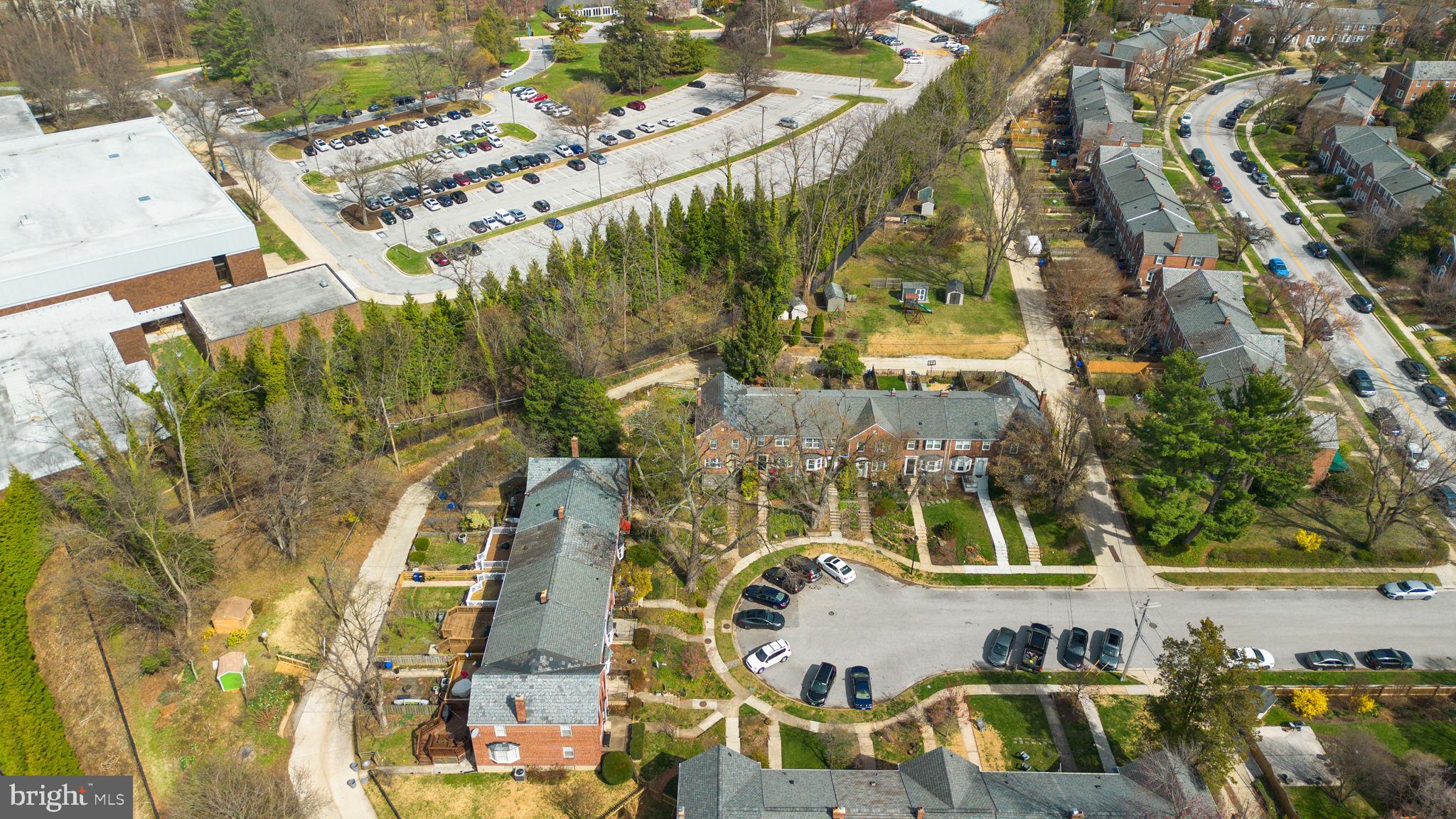7413 Stanmore Court Baltimore, MD 21212 - Photo 35 of 38 an aerial view of a residential apartment building with a yard