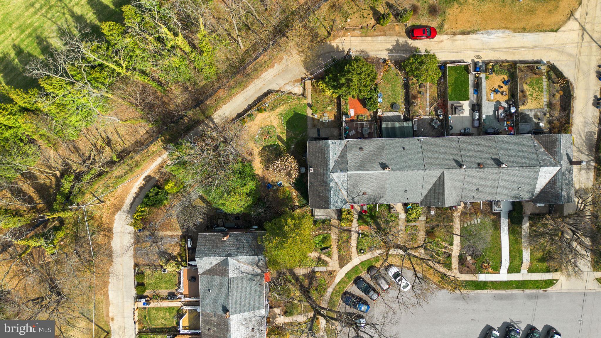 7413 Stanmore Court Baltimore, MD 21212 - Photo 36 of 38 an aerial view of a house with swimming pool and large trees