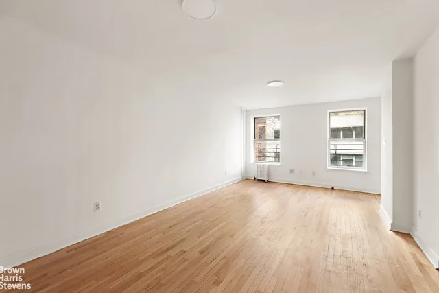 a view of living room with a large window