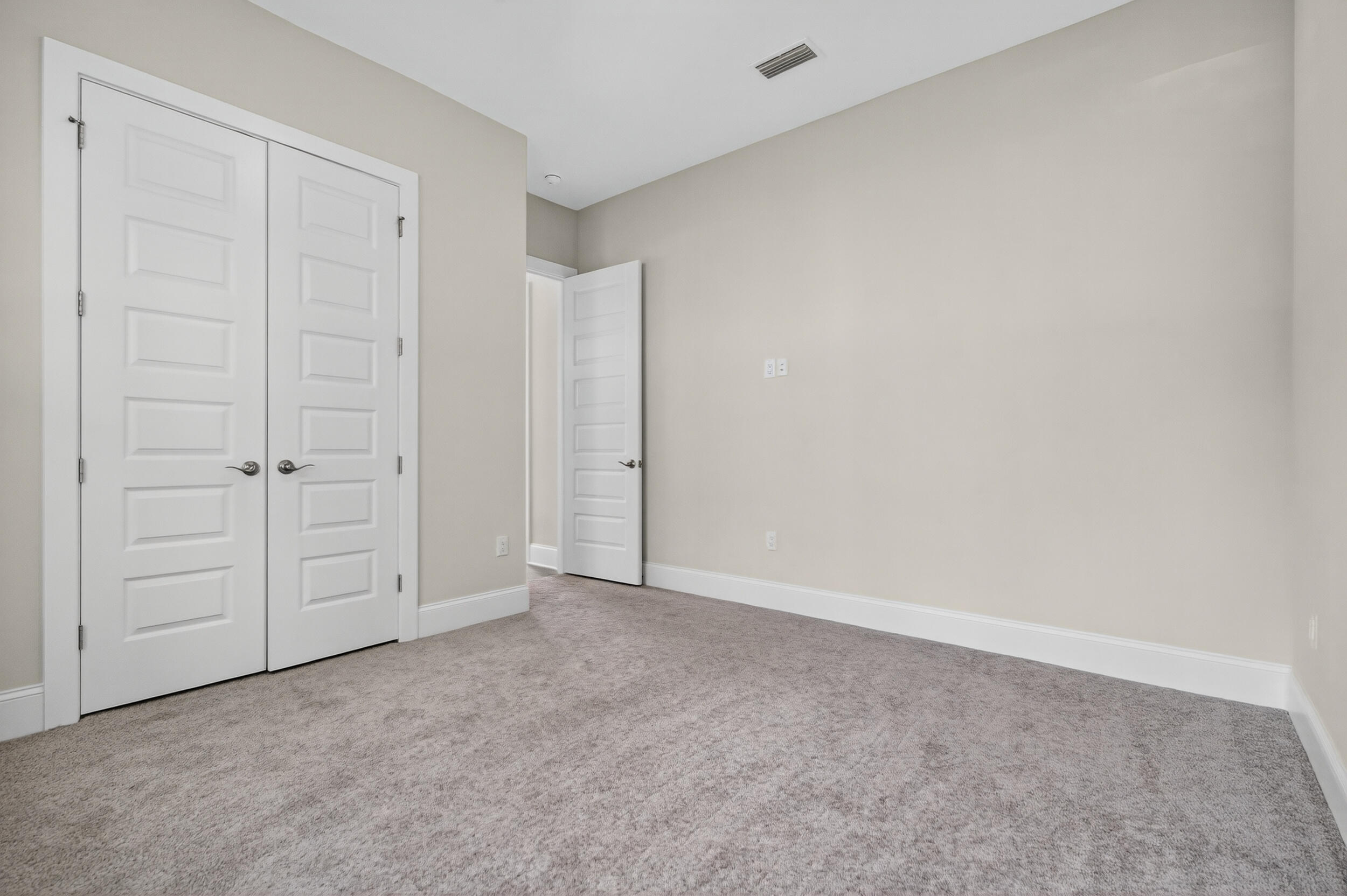 19 North J Hunter's Way, Unit LOT 22 Freeport, FL 32439 - Photo 26 of 48 an empty room with closet area