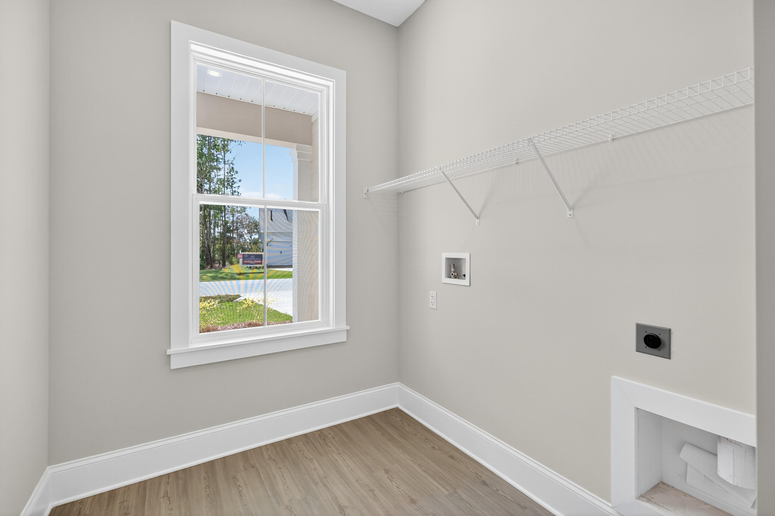 19 North J Hunter's Way, Unit LOT 22 Freeport, FL 32439 - Photo 31 of 48 a view of a small space with wooden floor and a window