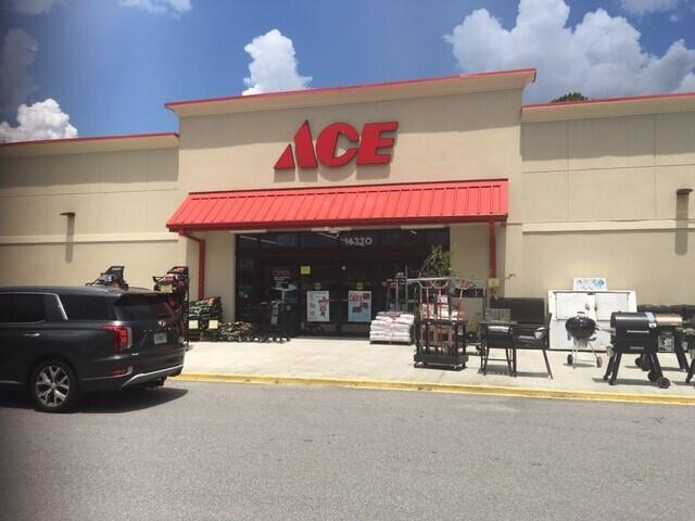 19 North J Hunter's Way, Unit LOT 22 Freeport, FL 32439 - Photo 48 of 48 a view of retail shop with a table and chairs