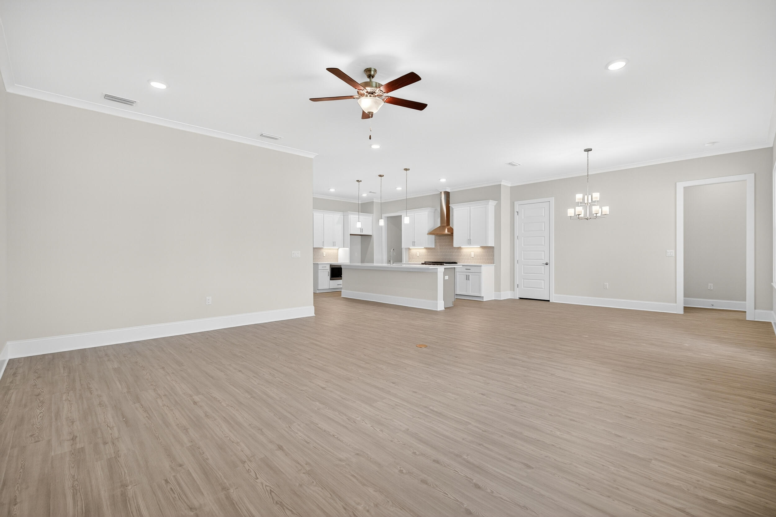 19 North J Hunter's Way, Unit LOT 22 Freeport, FL 32439 - Photo 8 of 48 a view of an empty room with a ceiling fan