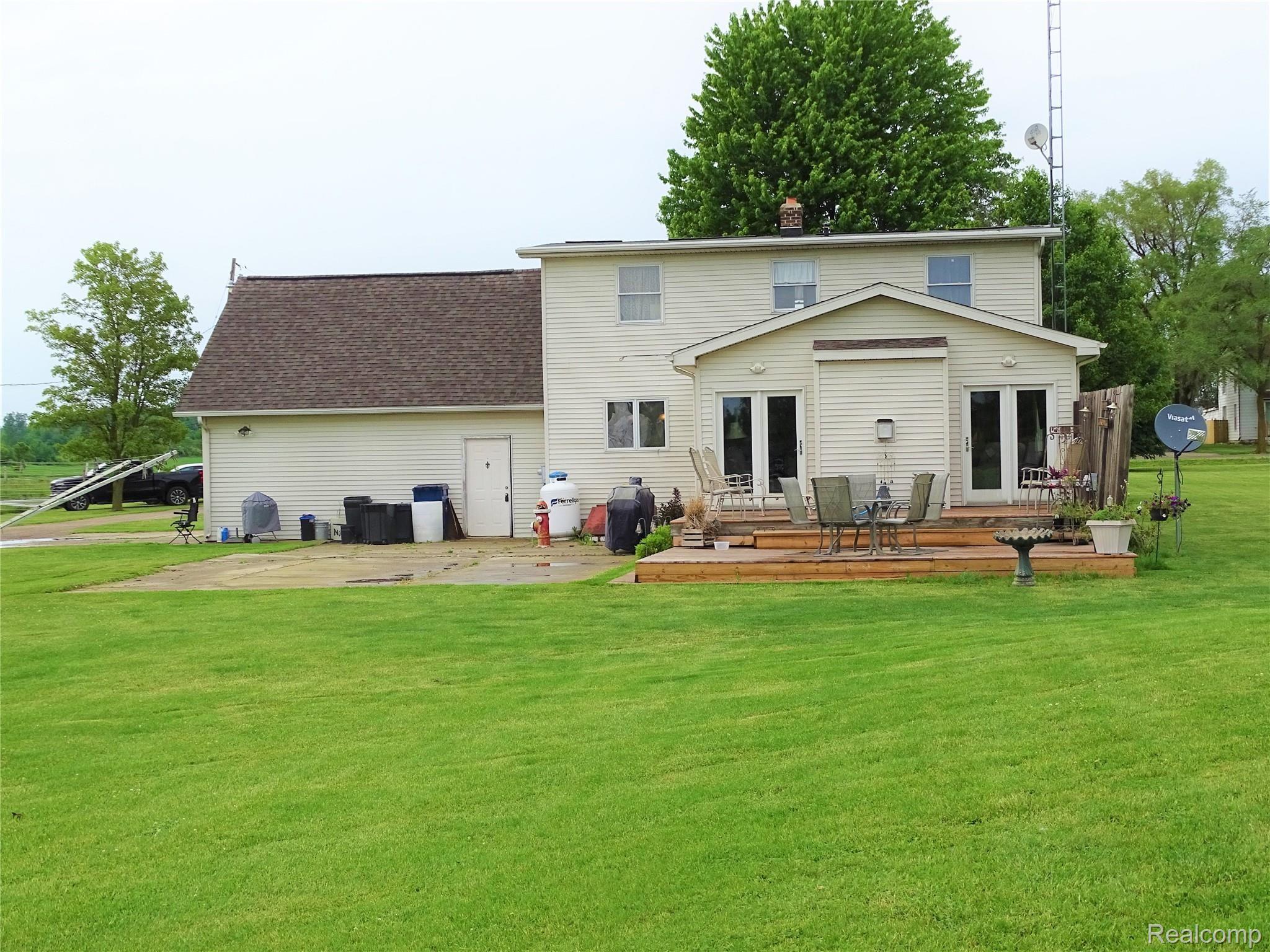 4202 East Wilson Road Clio, MI 48420 - Photo 22 of 28 Large deck to enjoy the summer!
