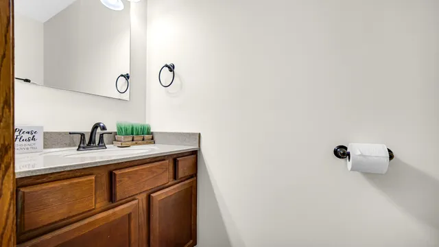 a utility room with sink dryer and washer