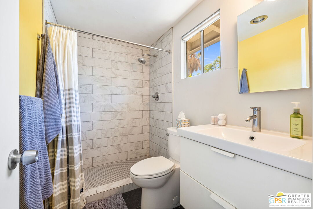 2267 North San Antonio Road Palm Springs, CA 92262 - Photo 11 of 40 a bathroom with a sink toilet and shower