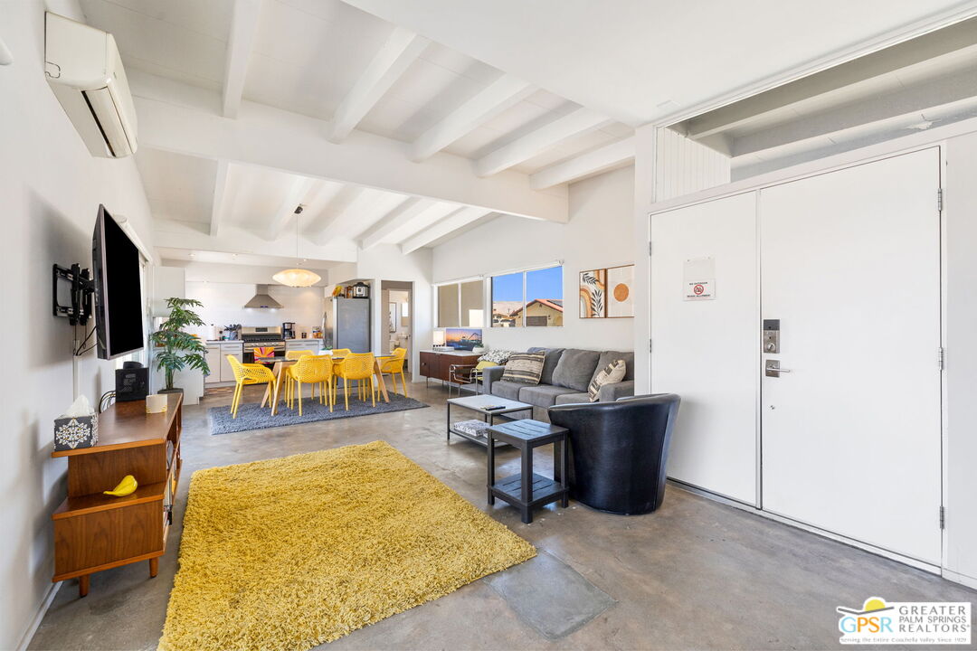 2267 North San Antonio Road Palm Springs, CA 92262 - Photo 19 of 40 a room with furniture and a flat screen tv