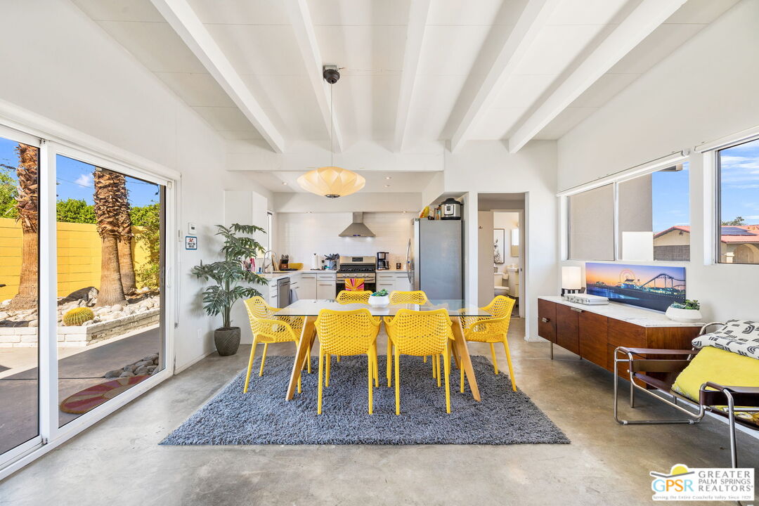 2267 North San Antonio Road Palm Springs, CA 92262 - Photo 21 of 40 a dining room with furniture