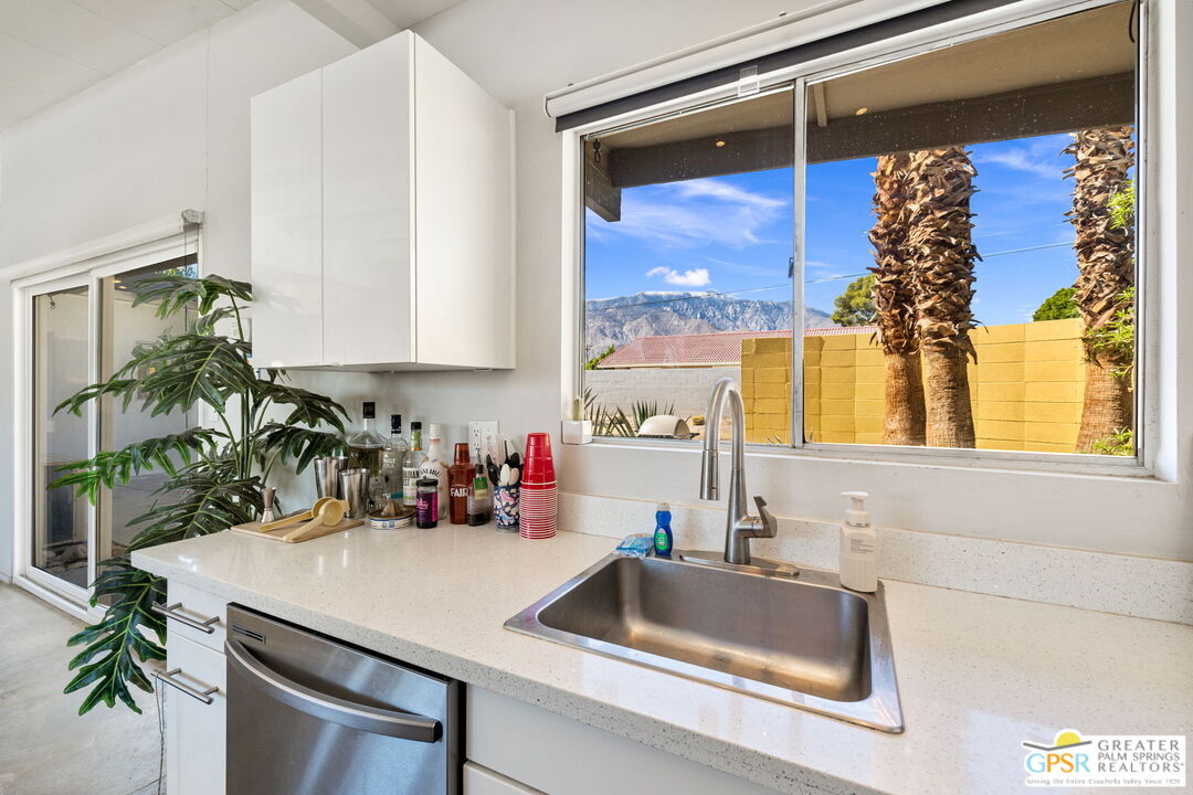 2267 North San Antonio Road Palm Springs, CA 92262 - Photo 22 of 40 a kitchen with a sink and a large window