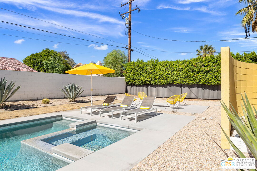 2267 North San Antonio Road Palm Springs, CA 92262 - Photo 27 of 40 a outdoor space with swimming pool and furniture