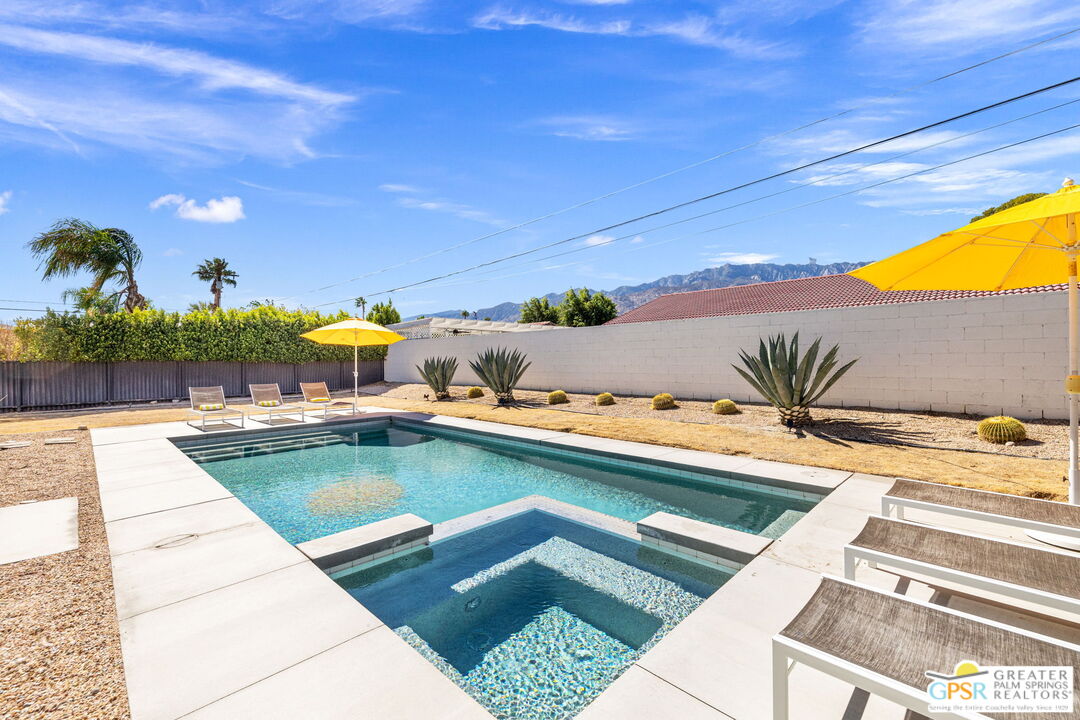 2267 North San Antonio Road Palm Springs, CA 92262 - Photo 28 of 40 a view of swimming pool with outdoor seating and plants