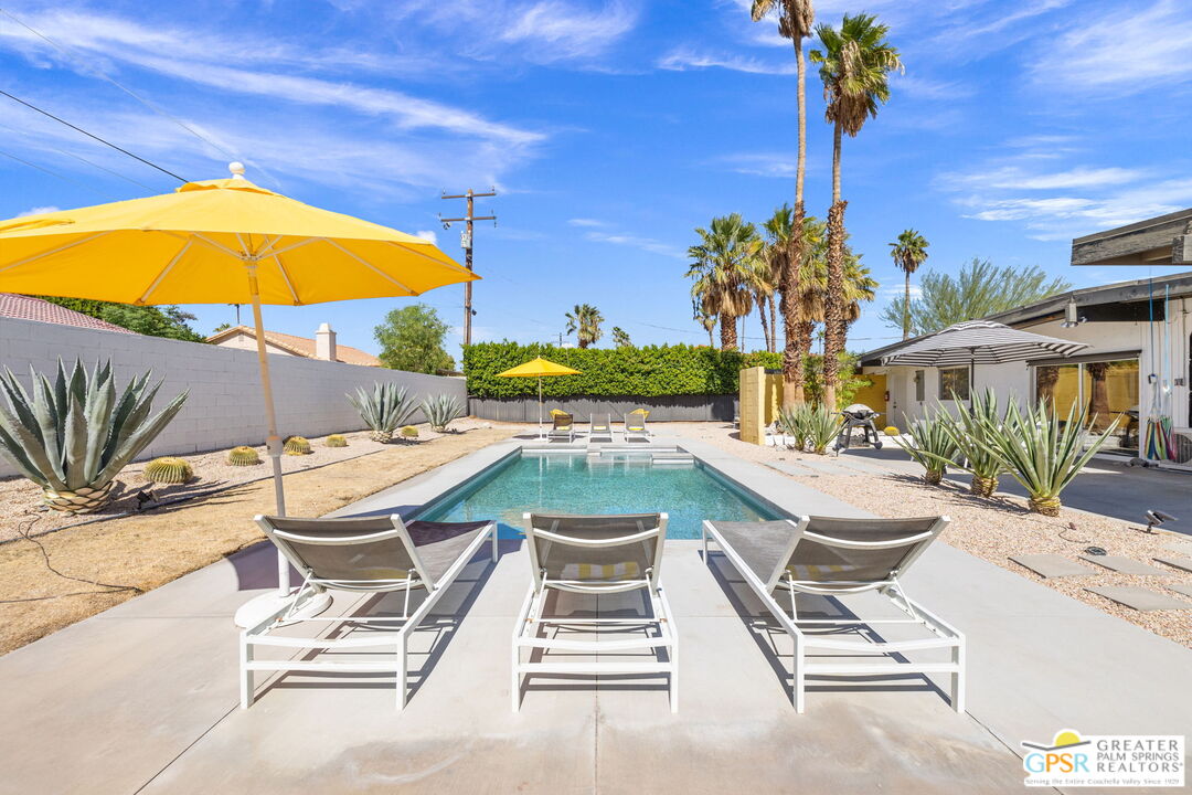 2267 North San Antonio Road Palm Springs, CA 92262 - Photo 33 of 40 a view of a patio with swimming pool