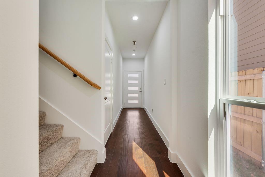 2346 Scott Street Dallas, TX 75215 - Photo 4 of 20 a view of entryway and hall with wooden floor