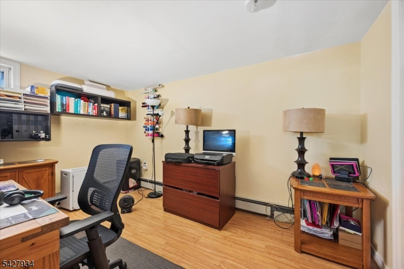 77 Brooklyn Road Stanhope, NJ 07874 - Photo 14 of 27 a view of a workspace with furniture and a window