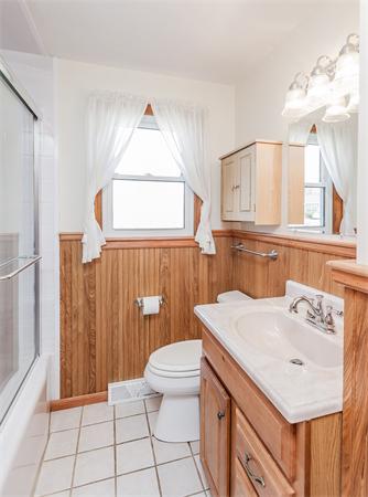 237 Carver Street Springfield, MA 01108 - Photo 17 of 25 a bathroom with a sink toilet and shower