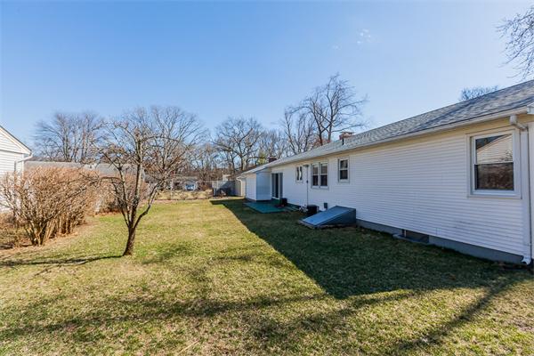 237 Carver Street Springfield, MA 01108 - Photo 23 of 25 a front view of a house with garden