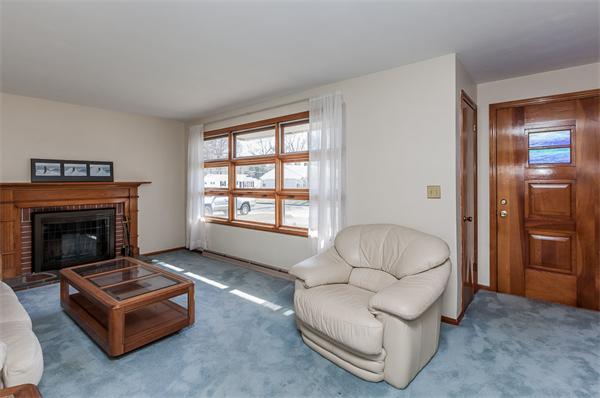 237 Carver Street Springfield, MA 01108 - Photo 3 of 25 a living room with furniture and a fireplace