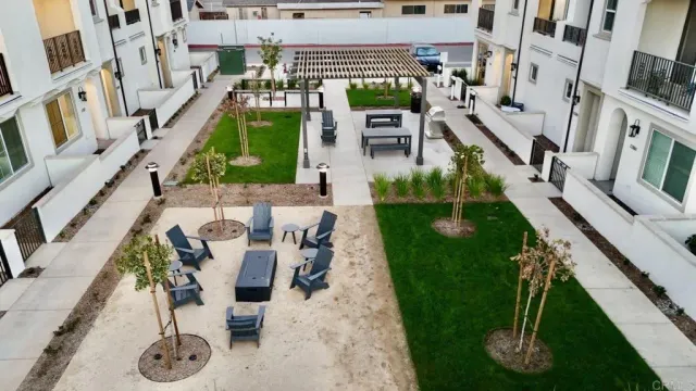 a view of an chairs and tables in the patio