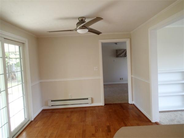 16 East Evergreen Road Natick, MA 01760 - Photo 8 of 16 a view of empty room with wooden floor and fan