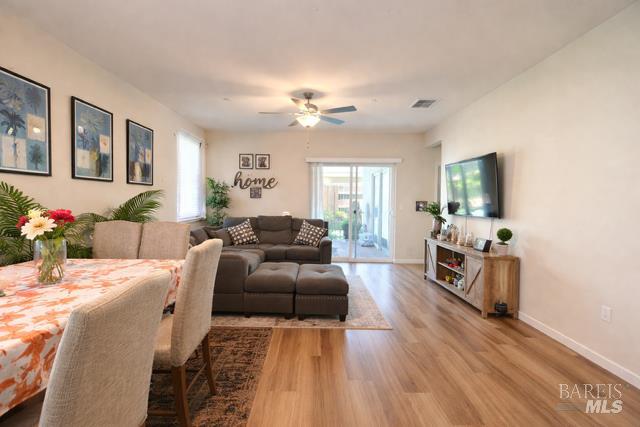 2250 Lavender Place Rio Vista, CA 94571 - Photo 2 of 13 a living room with furniture and a chandelier