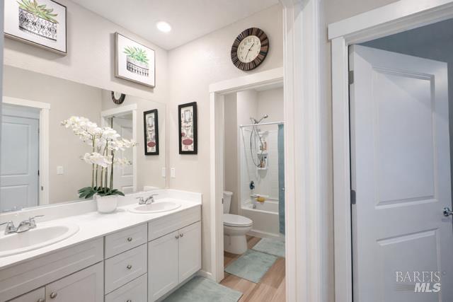 2250 Lavender Place Rio Vista, CA 94571 - Photo 9 of 13 a bathroom with a double vanity sink mirror and toilet