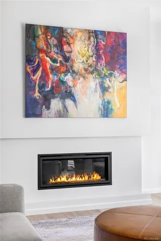 a view of fireplace with wooden floor