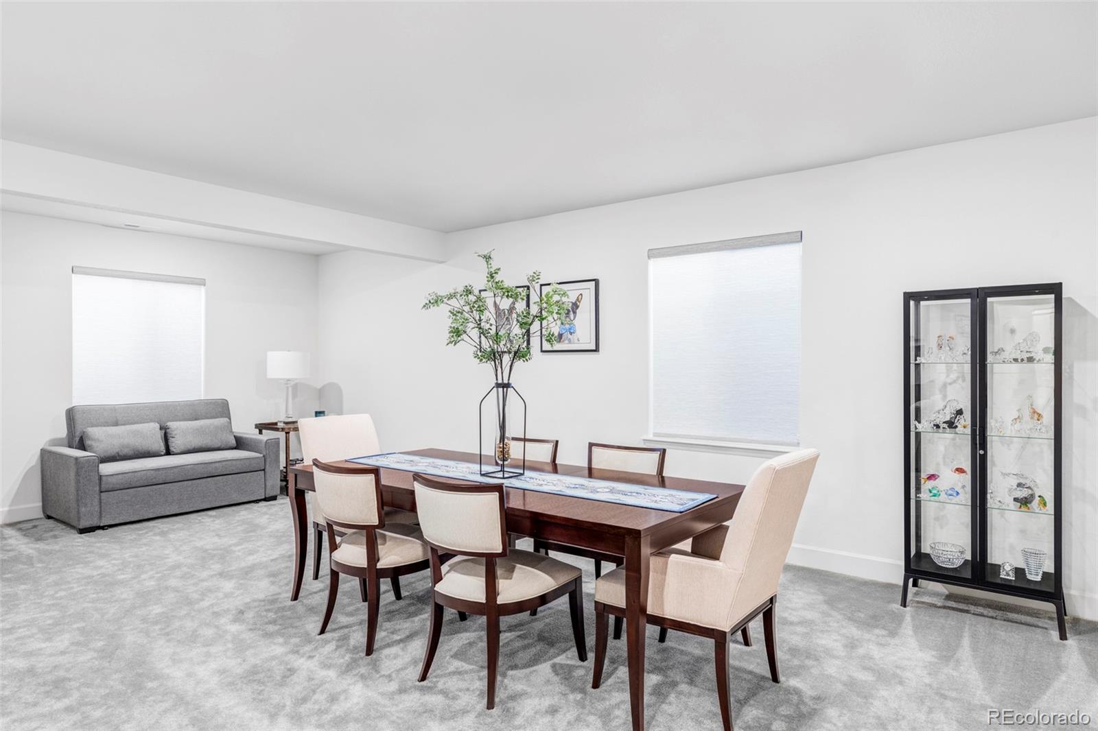 14395 Hop Clover Street Parker, CO 80134 - Photo 26 of 32 a view of a dining room with furniture and window