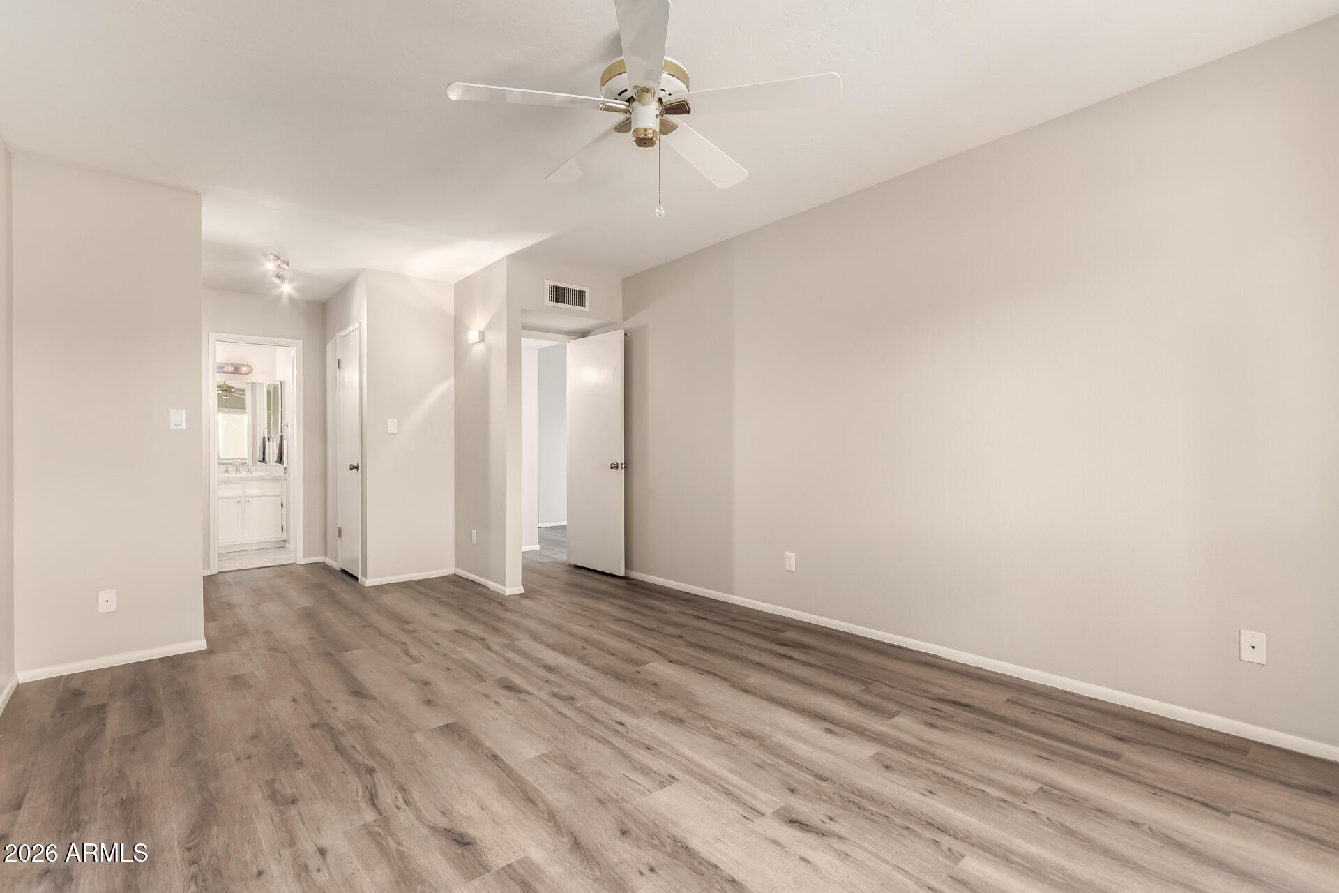 1833 West Citrus Way Phoenix, AZ 85015 - Photo 16 of 36 wooden floor in an empty room with a window