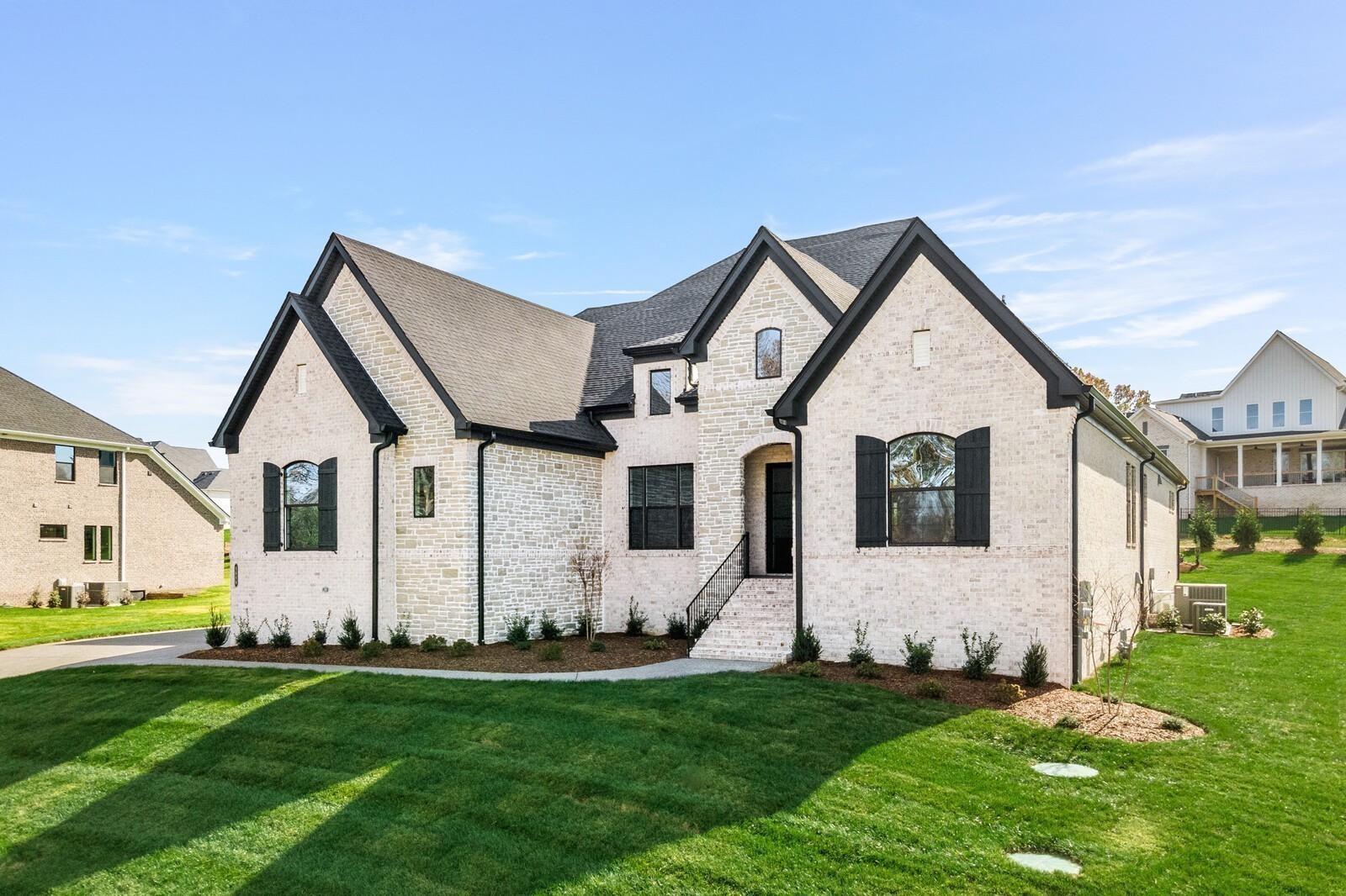 7265 Ruzek Court Fairview, TN 37062 - Photo 2 of 60 a front view of a house with a yard