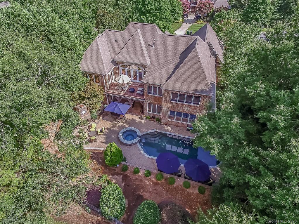 11211 McClure Manor Drive Charlotte, NC 28277 - Photo 1 of 44 an aerial view of a house with yard swimming pool and outdoor seating