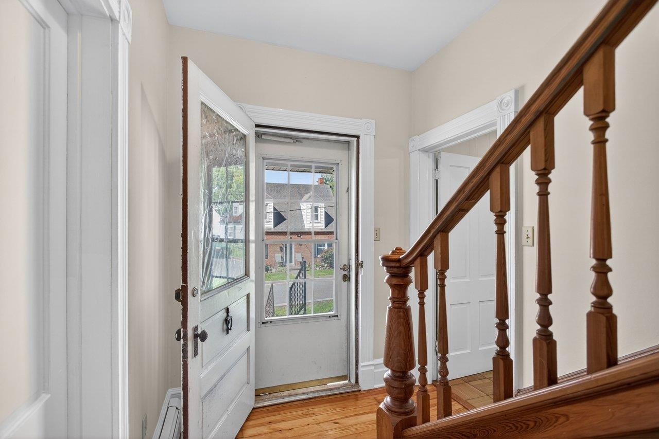 420 West Spring Street Woodstock, VA 22664 - Photo 5 of 67 a view of an entryway with wooden floor and door