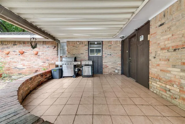 a view of a kitchen with storage and utility