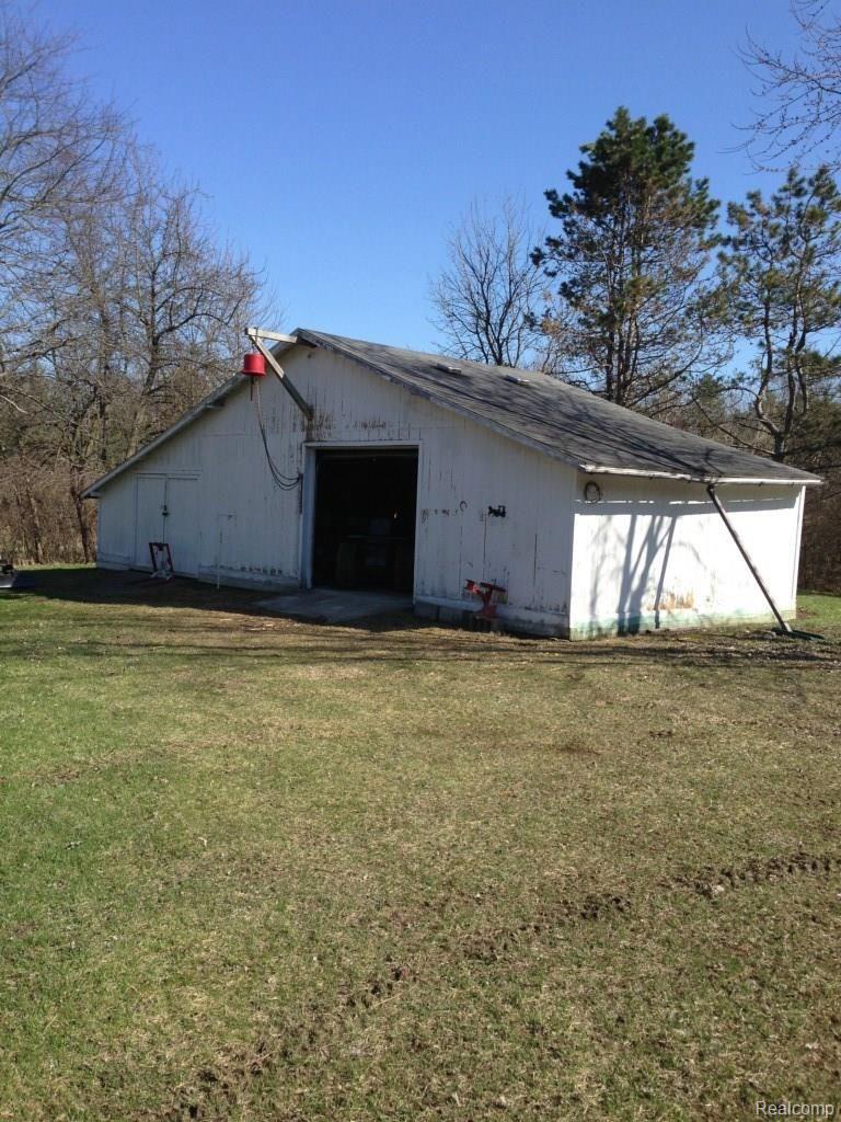 4124 North Henderson Road Davison, MI 48423 - Photo 20 of 25 30 x 16 barn with cement floor and electricity