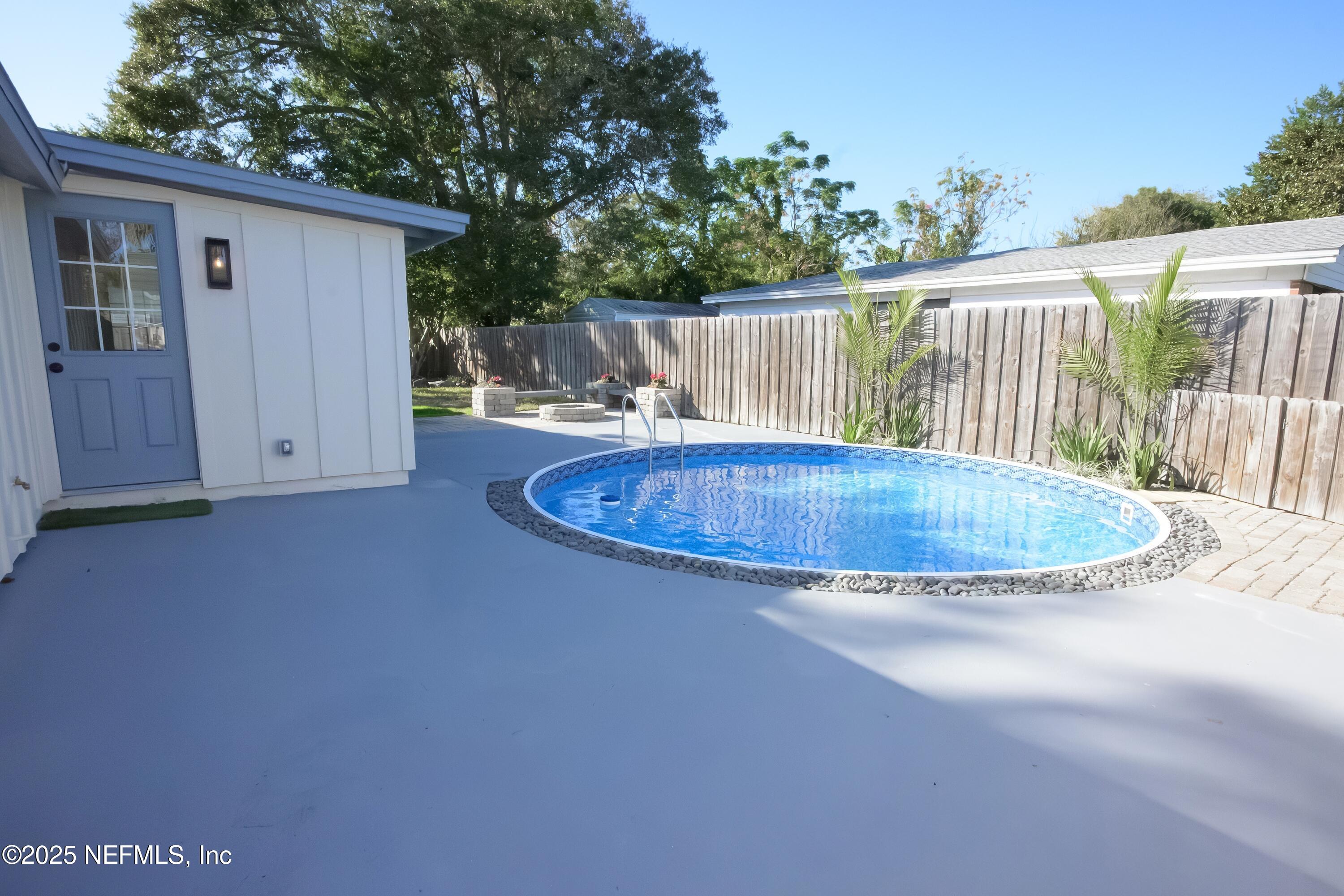 785 Triton Road Atlantic Beach, FL 32233 - Photo 26 of 46 a view of a small deck with a backyard