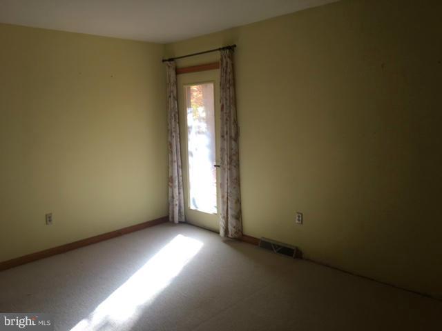 13728 Pryor Road Thurmont, MD 21788 - Photo 9 of 22 an empty room with windows
