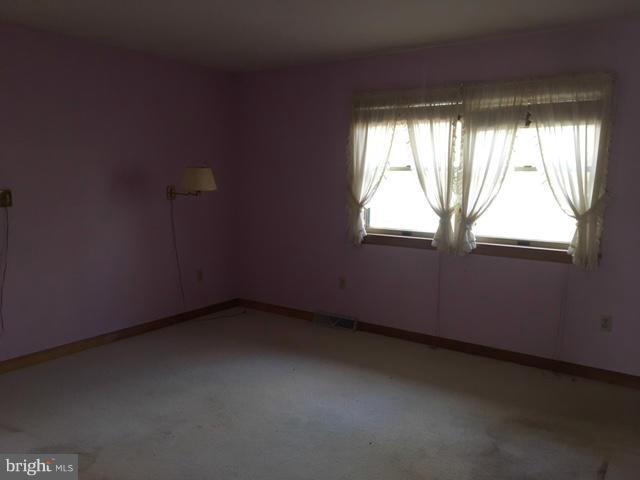 13728 Pryor Road Thurmont, MD 21788 - Photo 10 of 22 an empty room with a window