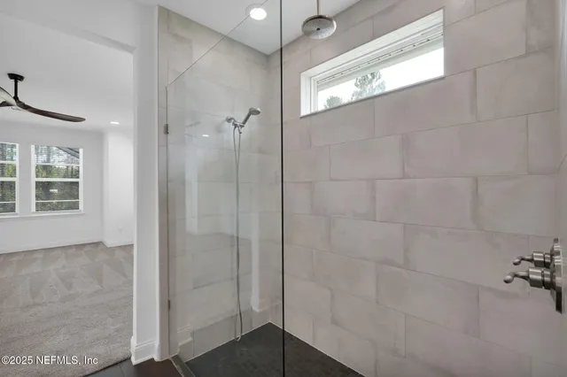 a view of a living room and dining room