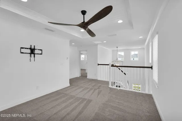 a view of a backyard with a swimming pool